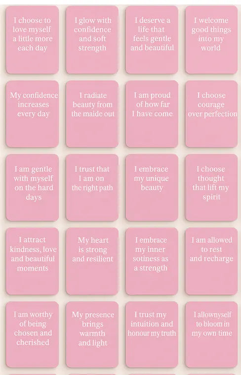 Pink cards with motivational phrases on a pink background